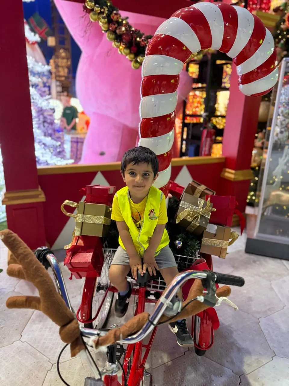 Children enjoying a colourful carousel ride during a Kids Kingdom excursion.